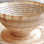 Old books repurposed into paper cups by Cecilia Levy